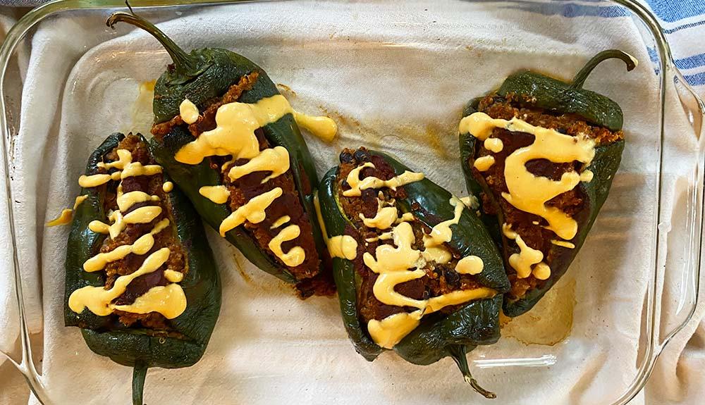 Plant Based Vegan Stuffed Poblano Peppers with Cheezy Drizzle Sauce