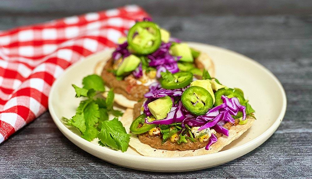 Plant Based Tostadas with Creamy Pintos and Mexican Street Corn